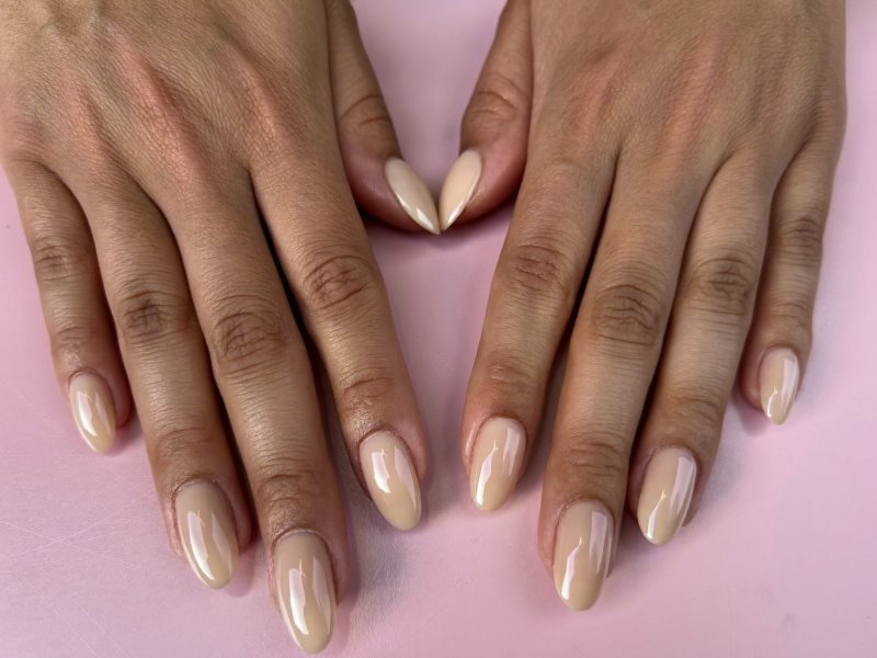 Almond vs oval nails shown side by side on two hands