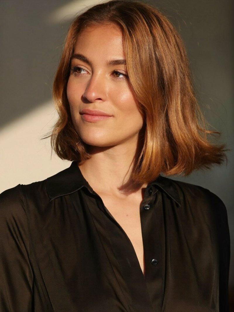 Chin-length chestnut Italian bob with full ends and a soft side part