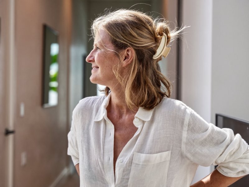 Easy medium length hairstyles: a woman with shoulder-length hair in a claw clip twist