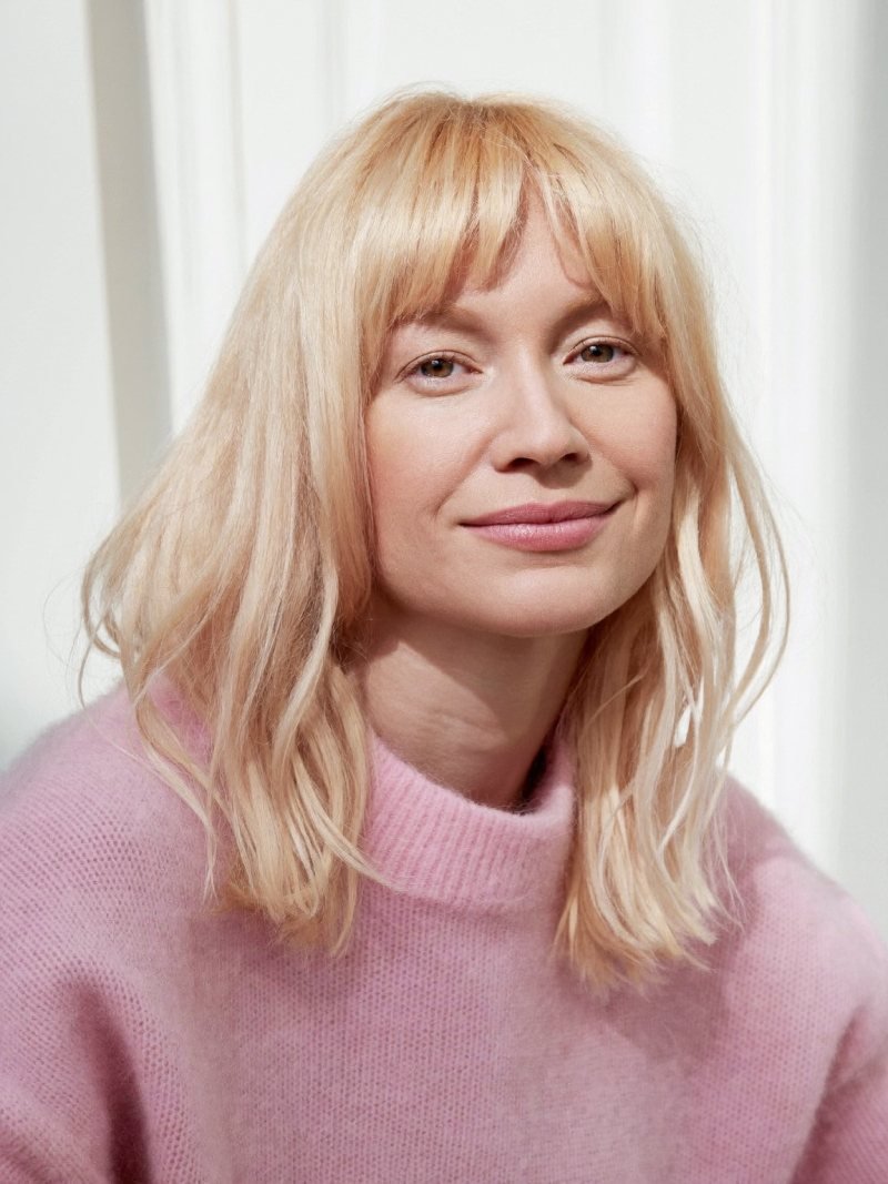 Fine light blonde hair with thin wispy bangs