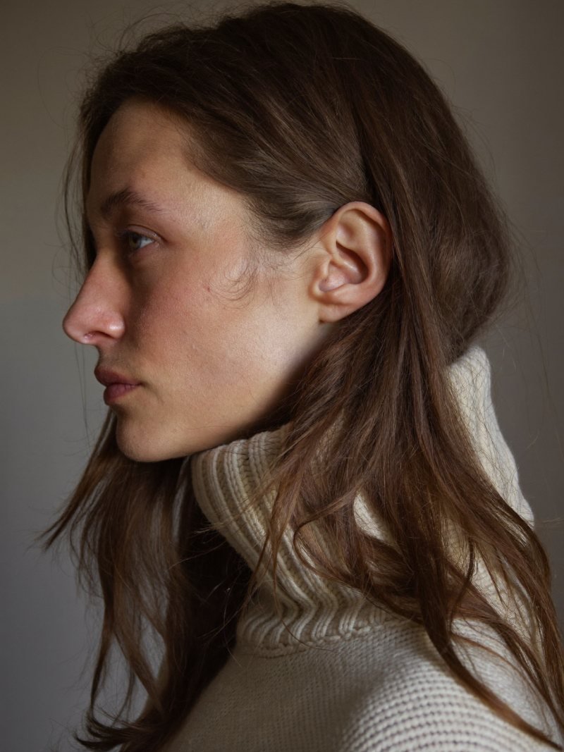 Long chestnut hair cut in long layers with movement at the ends
