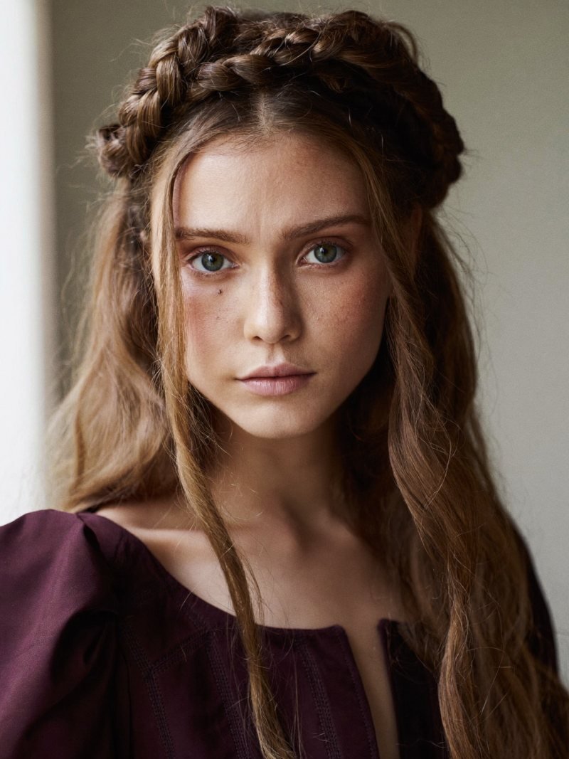 Long hair in a braided crown wrapped around the head