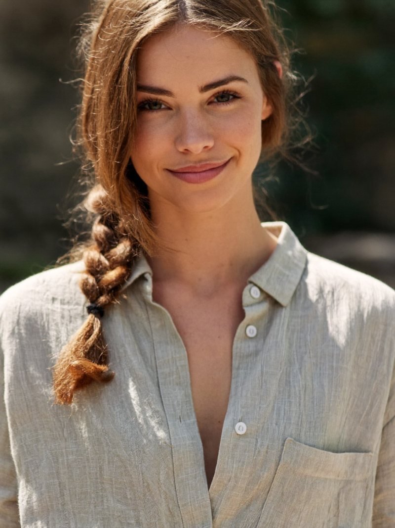 Long hair in a loose side braid