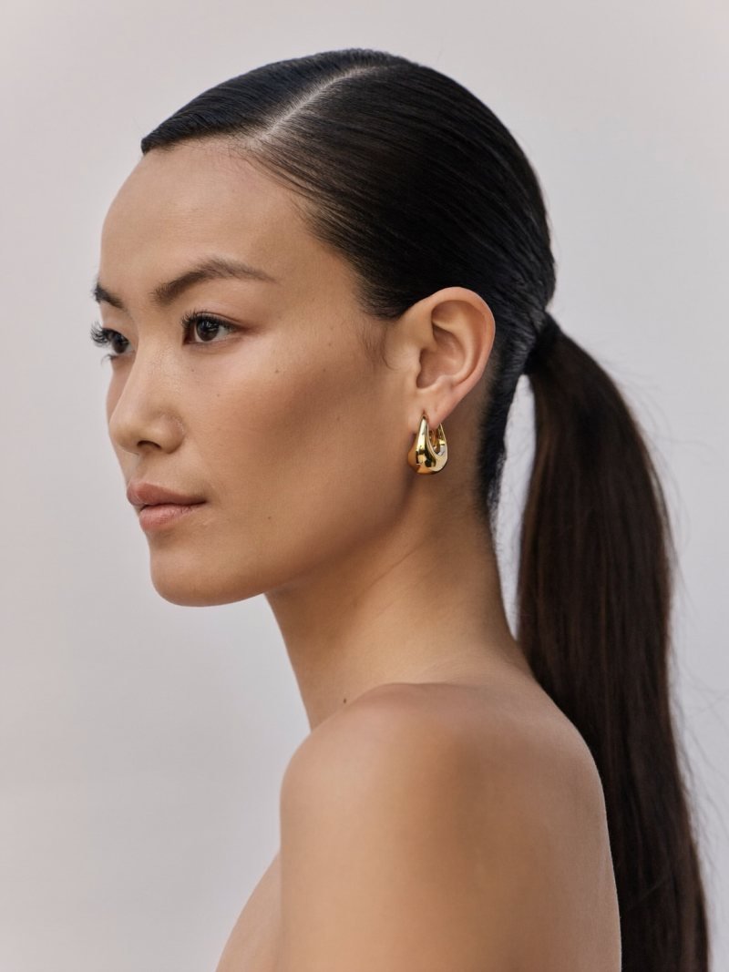 Long hair in a sleek low ponytail