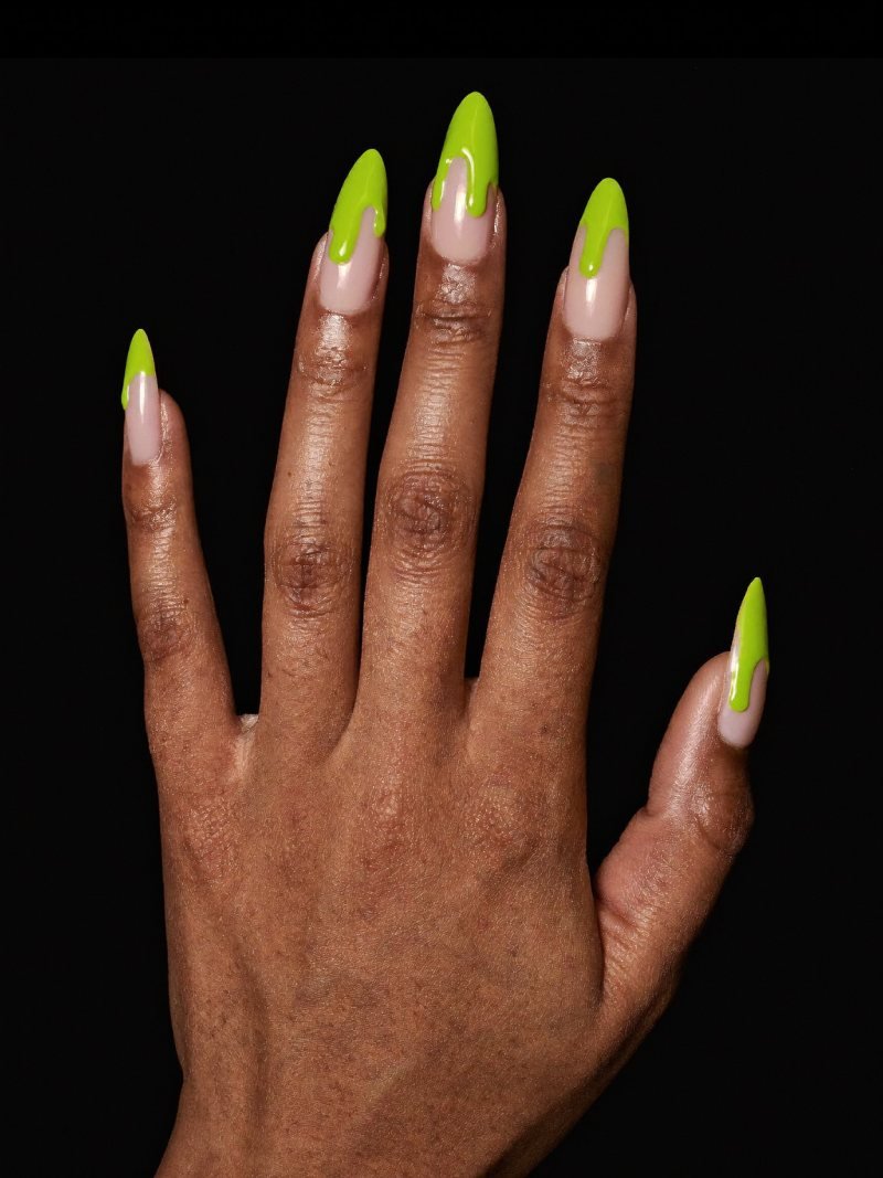 Medium almond nude nails with bright green dripping French tips