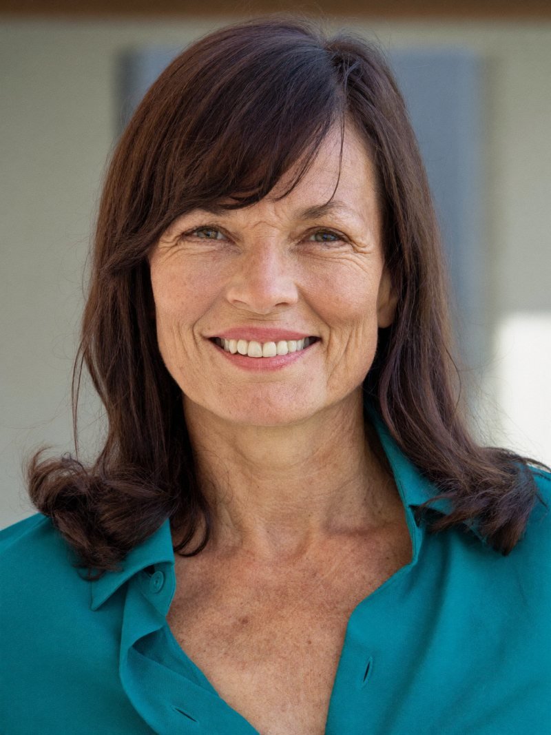 Medium dark brown hair with long side-swept bangs