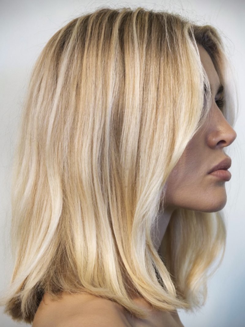 Medium length fine hair with a blunt baseline and subtle layers