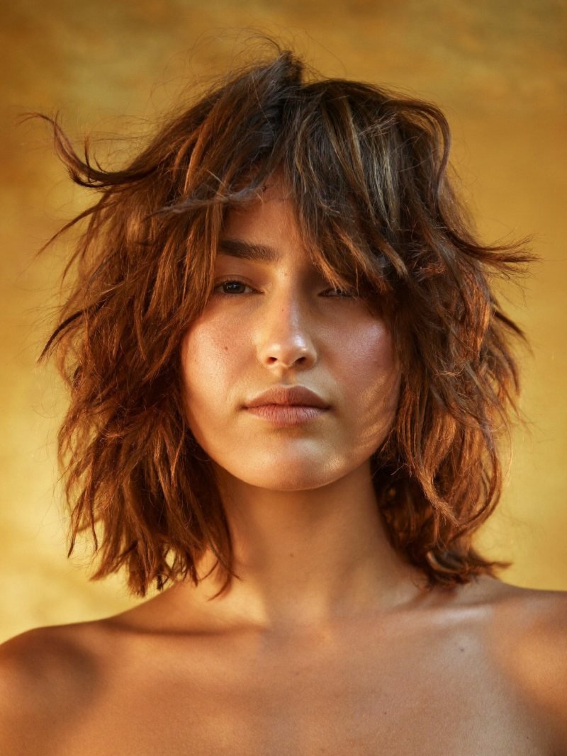 Medium length shag haircut with textured layers