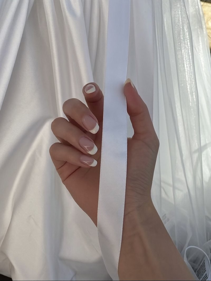 Medium oval soft French manicure for a bride