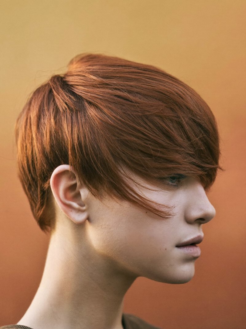 Pixie cut with a long side-swept fringe