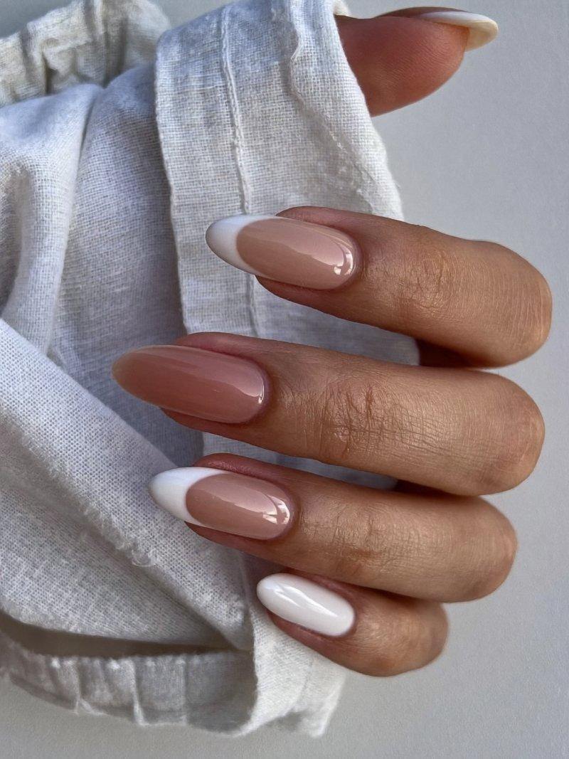 Short almond nails alternating nude and milky white