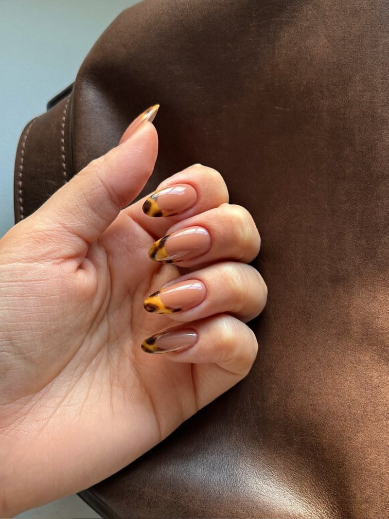 Short almond nails with tortoiseshell French tips
