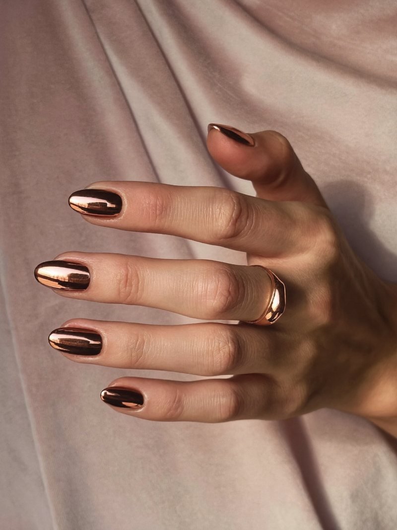 Short almond rose gold chrome nails