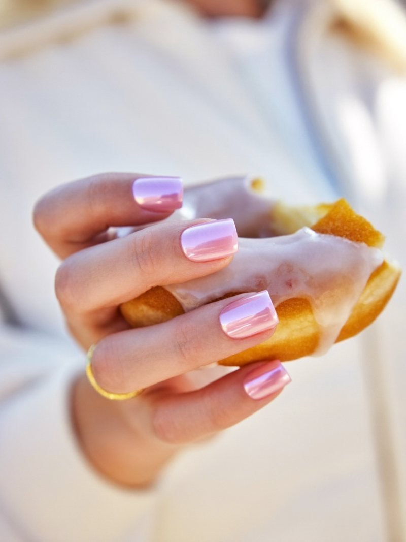 Short chrome nails with a glazed sheer pink finish