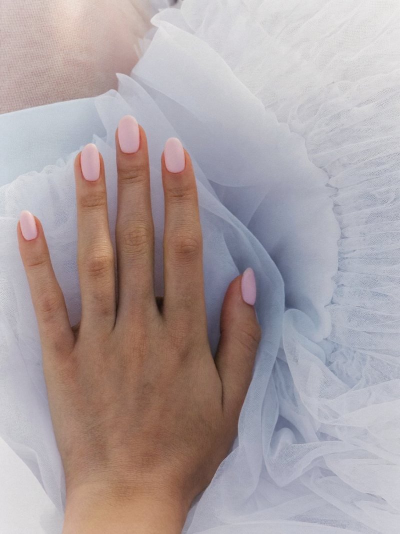 Short oval matte blush pink nails for a bride