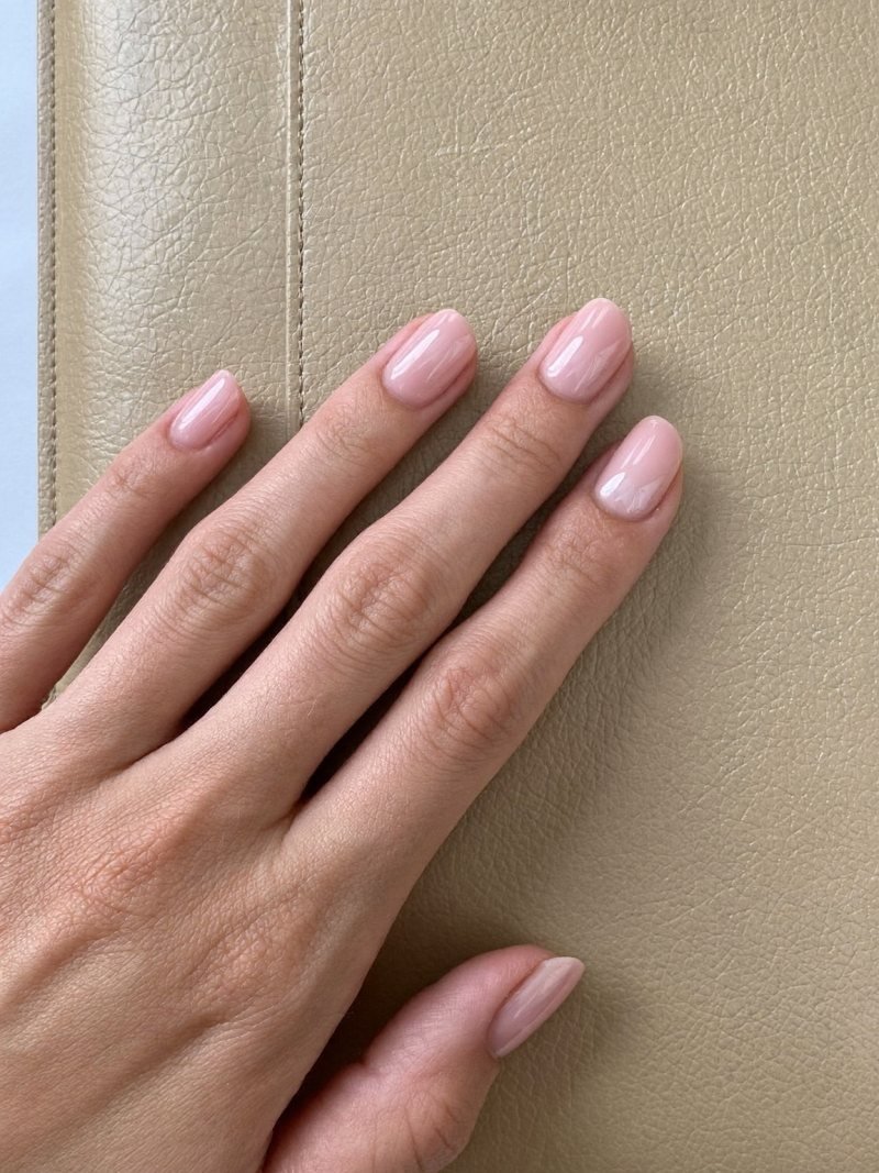 Short round gel nails in soft rose pink
