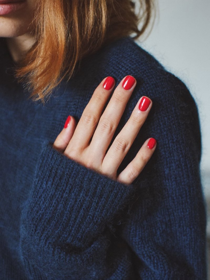 Short round nails in solid glossy red